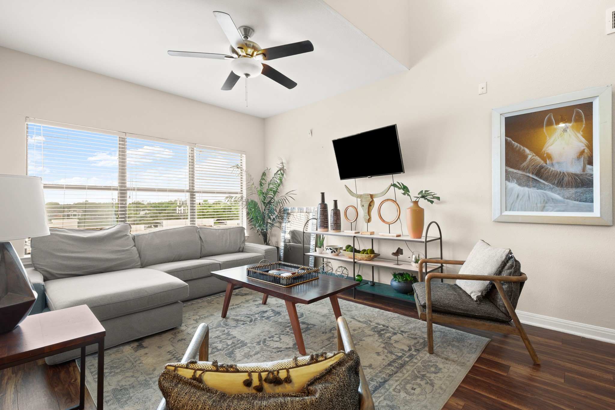 2502 Leon Street, Unit 512 Austin, TX 78705 - Photo 6 of 27 Natural light and neutral finishes create a welcoming setting in the main living space.