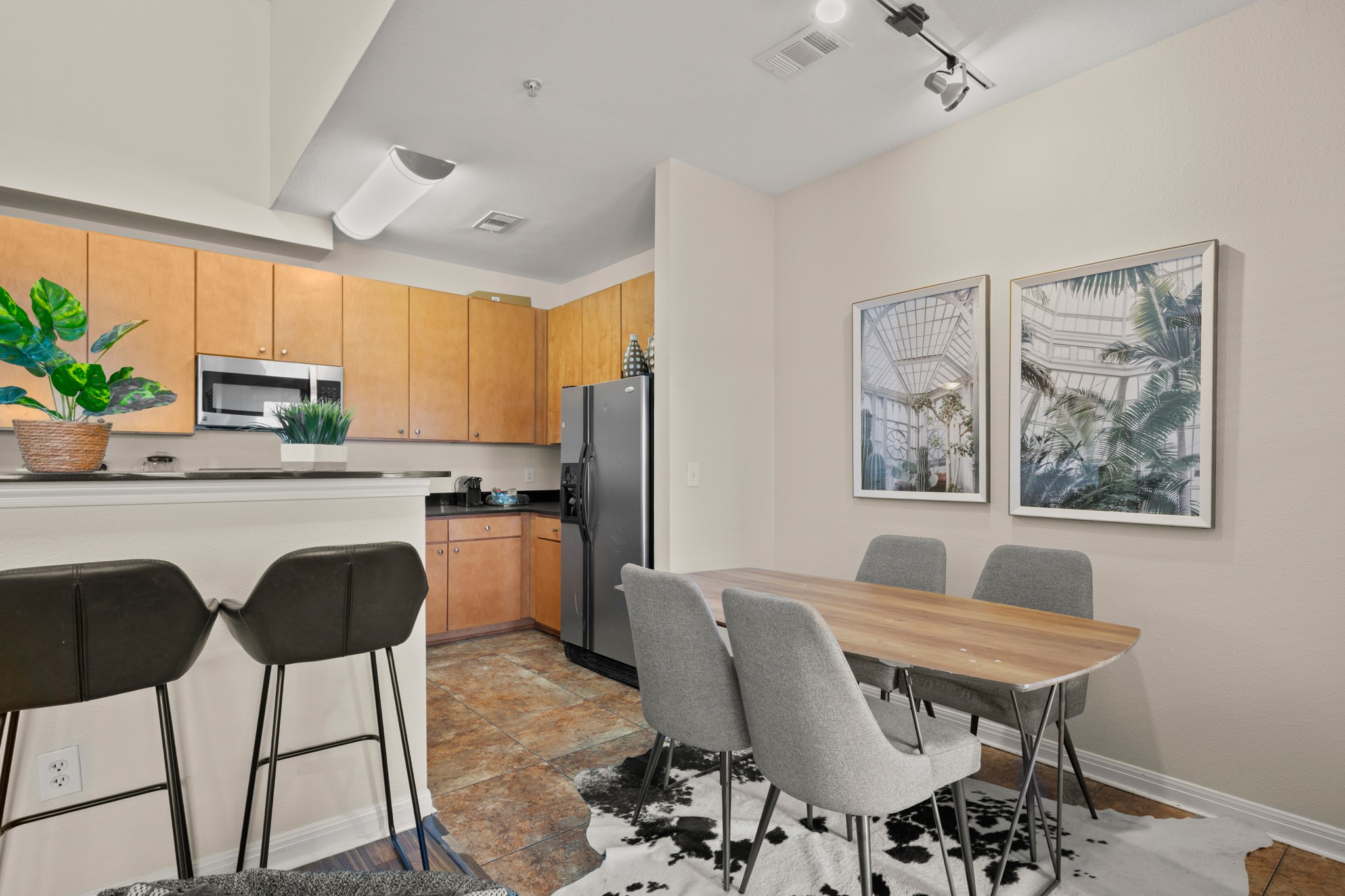 2502 Leon Street, Unit 512 Austin, TX 78705 - Photo 9 of 27 The dining area sits just off the kitchen, creating a convenient space for everyday meals or casual gatherings.