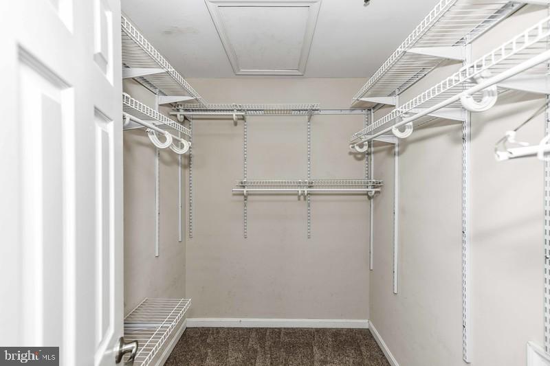 2 Parker Farm Court Silver Spring, MD 20906 - Photo 28 of 34 a view of walk in closet with empty racks