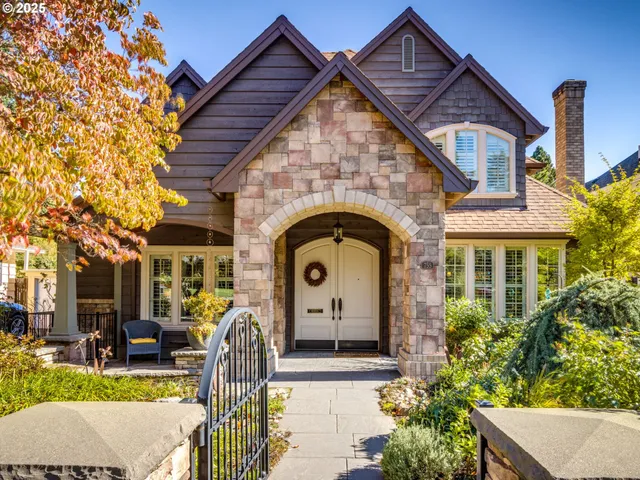 a front view of a house with garden
