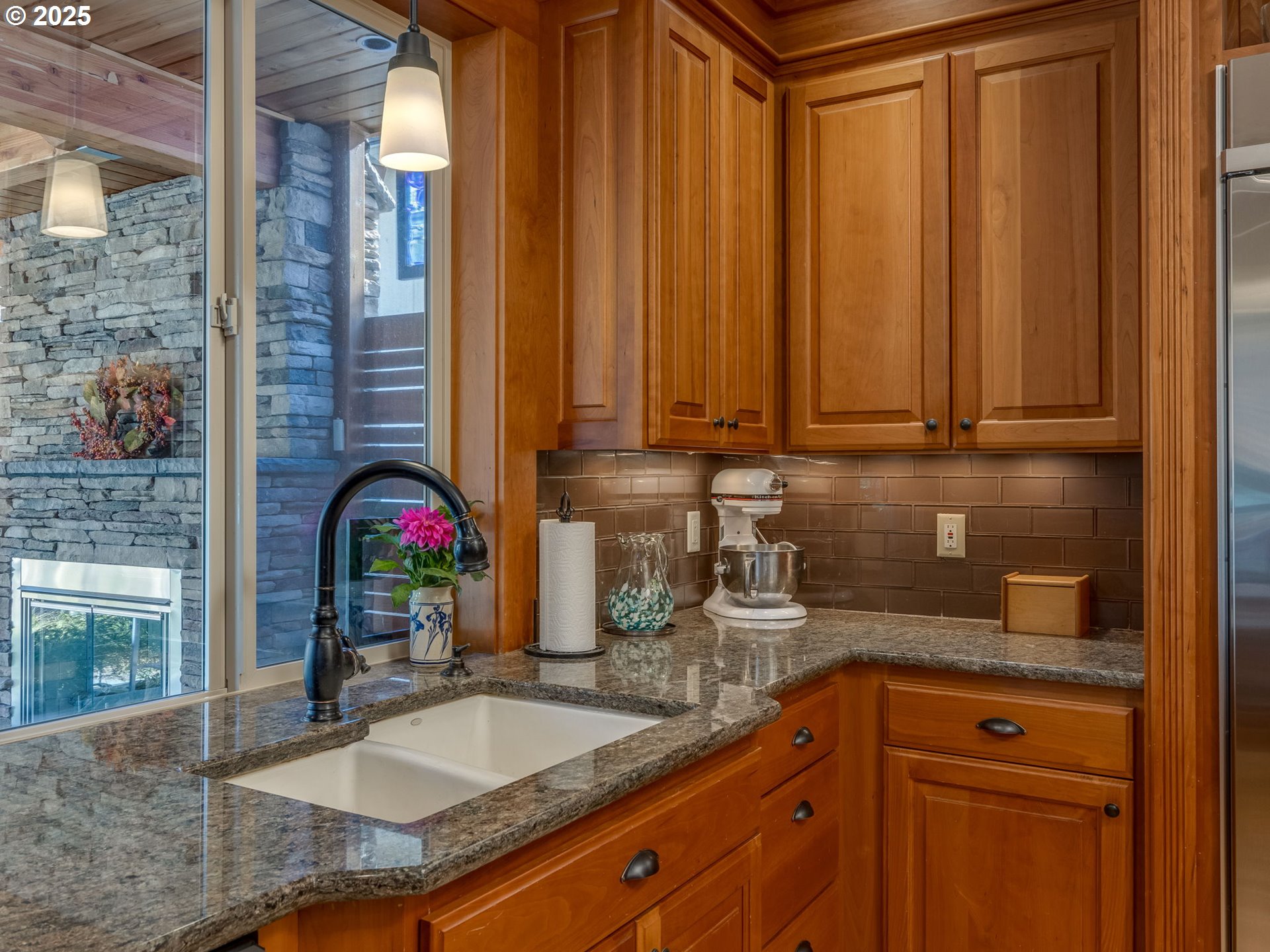 755 6th Street Lake Oswego, OR 97034 - Photo 11 of 48 a kitchen with stainless steel appliances granite countertop a sink dishwasher and cabinets with wooden floor