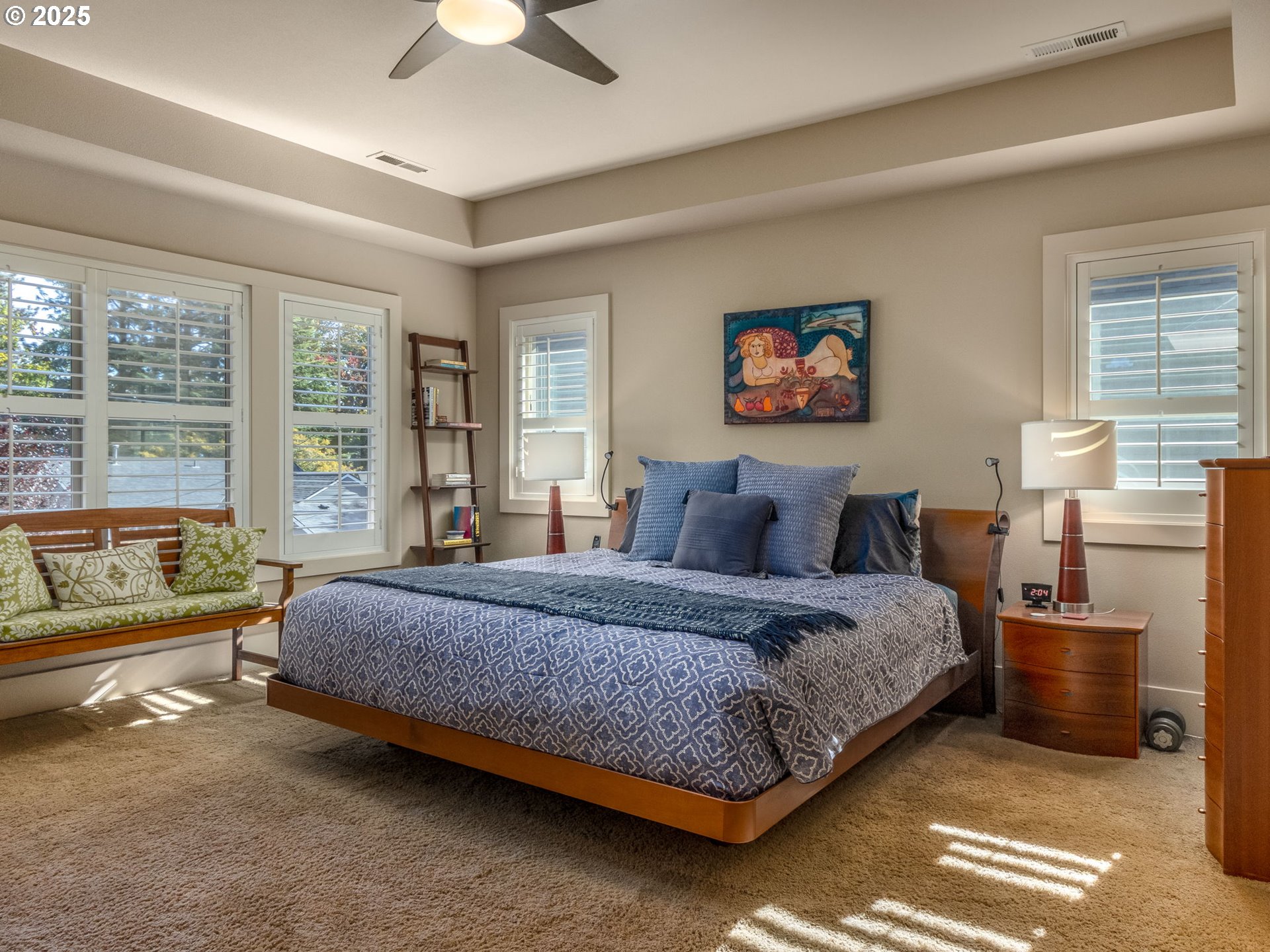 755 6th Street Lake Oswego, OR 97034 - Photo 19 of 48 a spacious bedroom with a bed and a couch