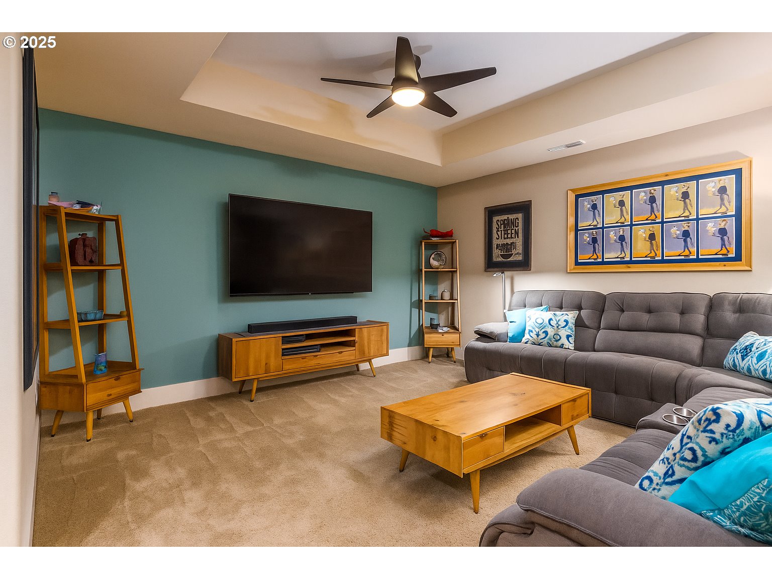 755 6th Street Lake Oswego, OR 97034 - Photo 29 of 48 a living room with furniture and a flat screen tv