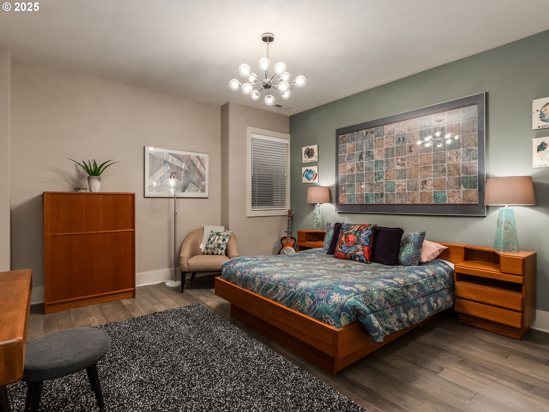 755 6th Street Lake Oswego, OR 97034 - Photo 32 of 48 a bedroom with a bed chandelier and a window