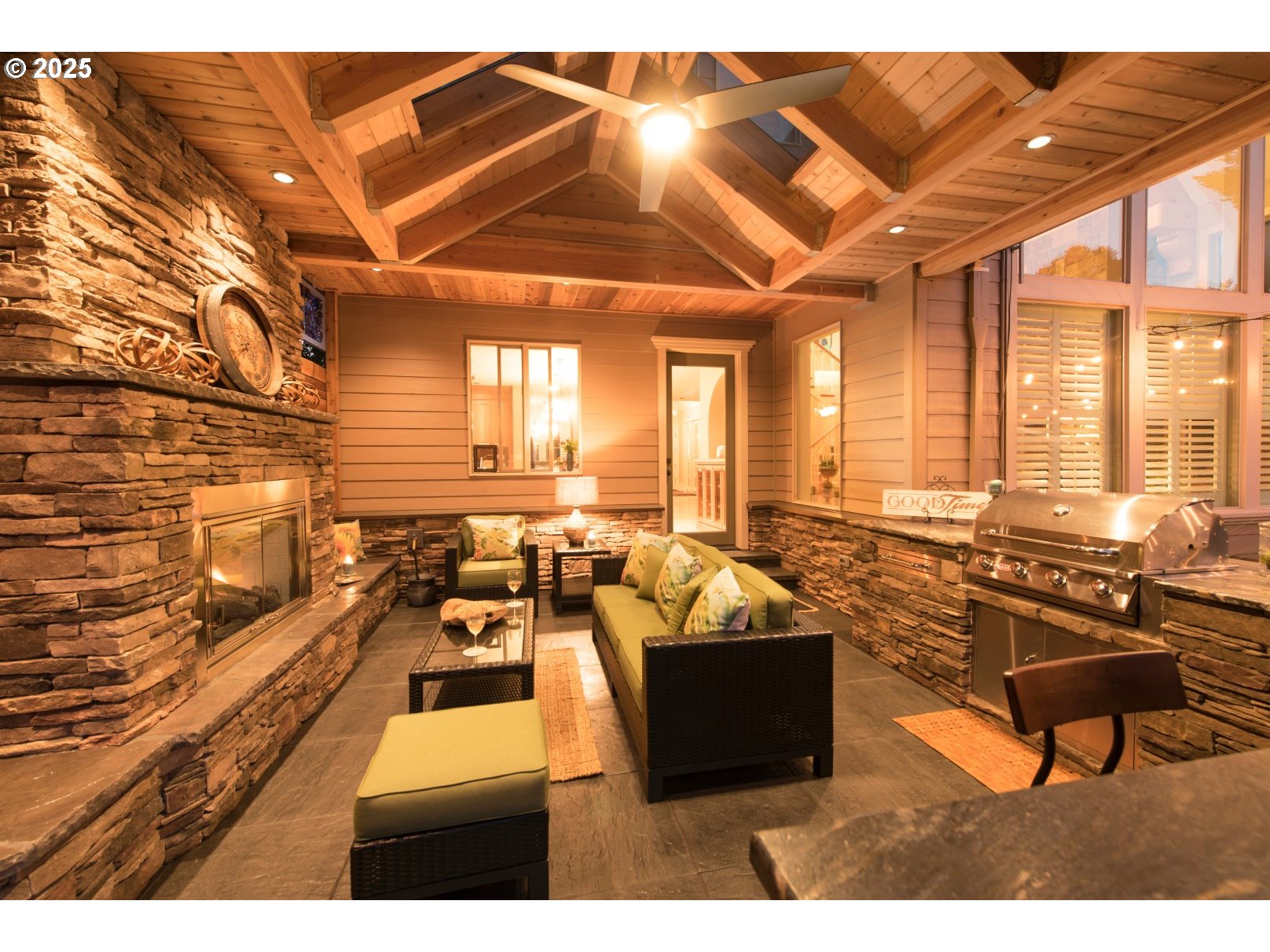 755 6th Street Lake Oswego, OR 97034 - Photo 44 of 48 a living room with furniture a flat screen tv and a chandelier