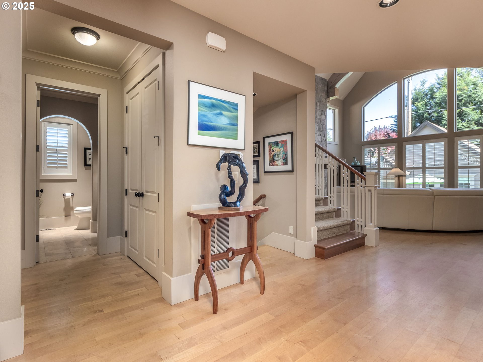 755 6th Street Lake Oswego, OR 97034 - Photo 6 of 48 a view of a hallway with wooden floor and windows
