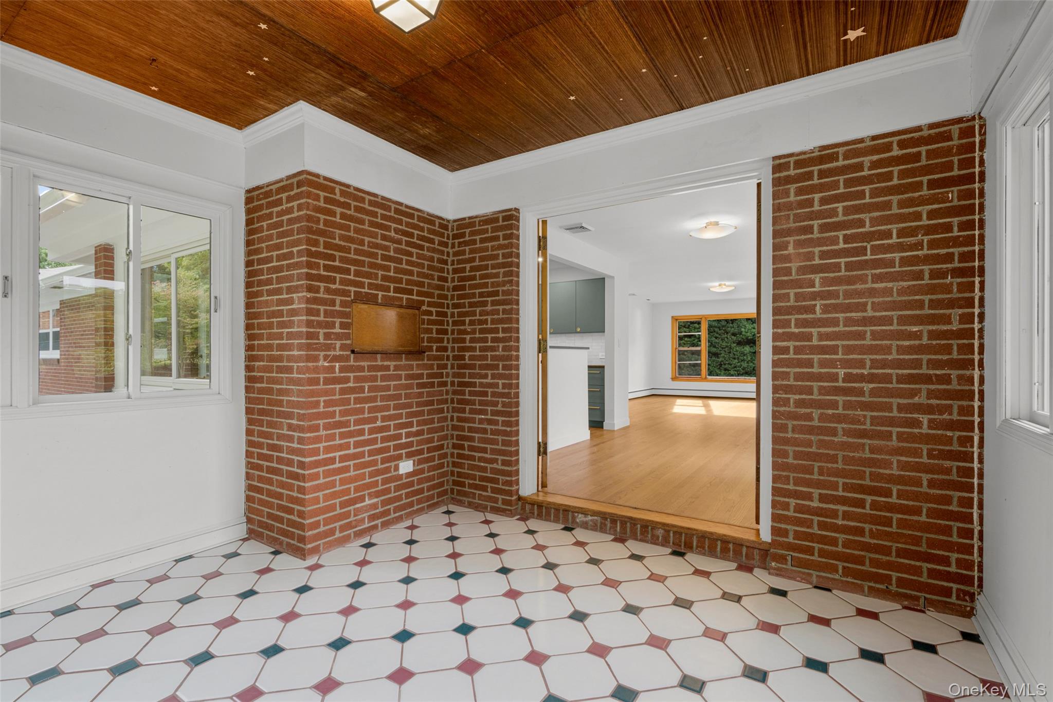 1 Craigside Drive Cold Spring, NY 10516 - Photo 27 of 36 Tiled sunroom with entrance to the dining area