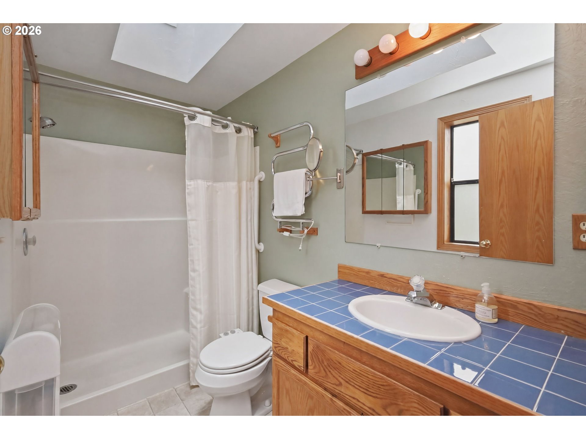 2983 Timberline Drive Eugene, OR 97405 - Photo 18 of 31 a bathroom with a sink toilet and shower