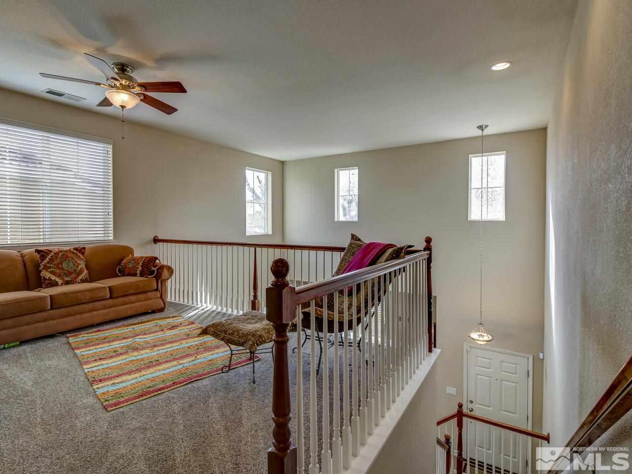 555 Little Sorrel Court Reno, NV 89521 - Photo 14 of 25 a living room with furniture and stairs