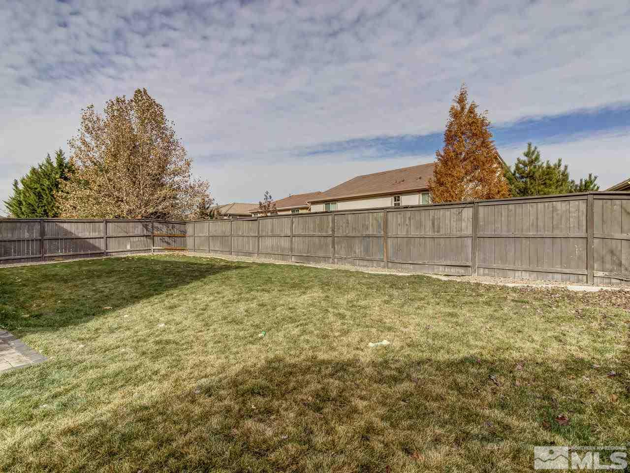 555 Little Sorrel Court Reno, NV 89521 - Photo 24 of 25 a view of a yard with a fence