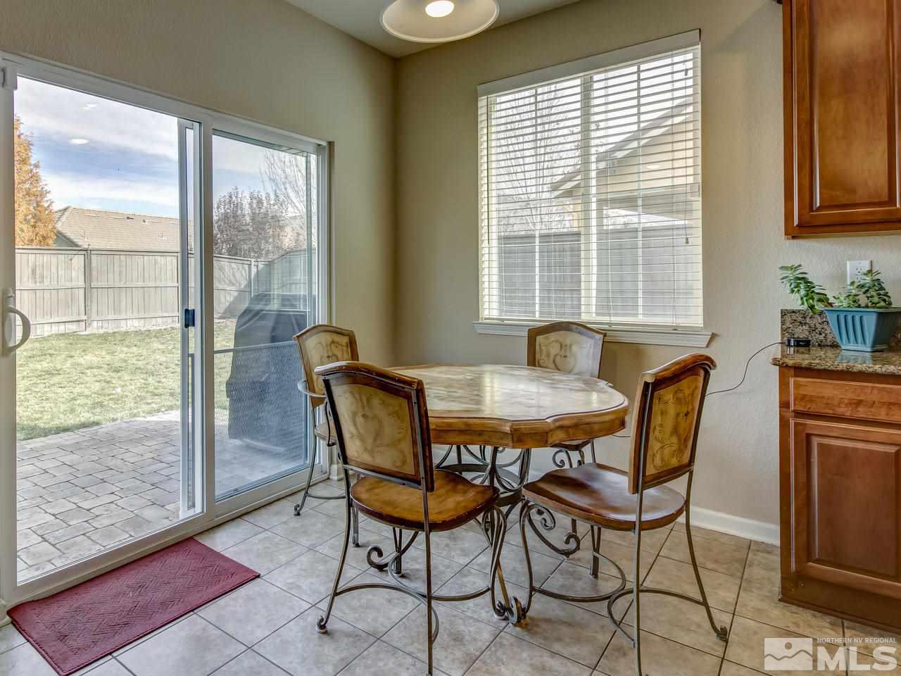555 Little Sorrel Court Reno, NV 89521 - Photo 5 of 25 a dining room with furniture and window