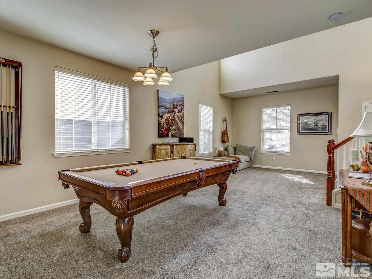 555 Little Sorrel Court Reno, NV 89521 - Photo 8 of 25 a room with pool table and windows