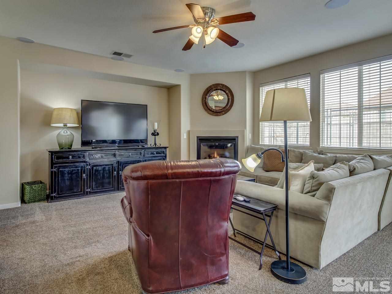 555 Little Sorrel Court Reno, NV 89521 - Photo 9 of 25 a living room with furniture and a flat screen tv