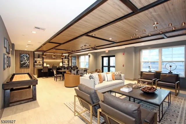 a living room with furniture and a table