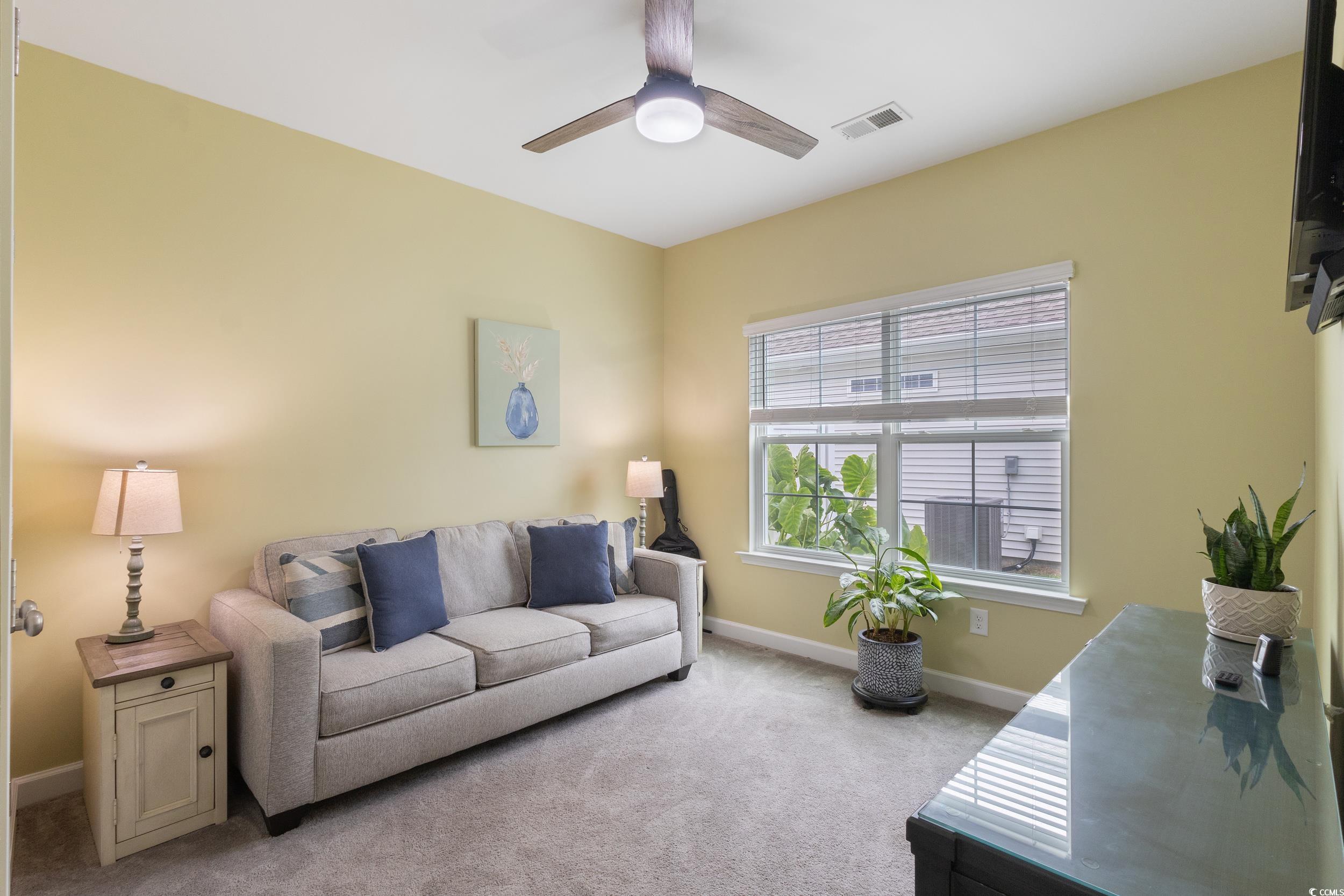 540 Canborough Lane Murrells Inlet, SC 29576 - Photo 13 of 40 Living area with carpet flooring and ceiling fan