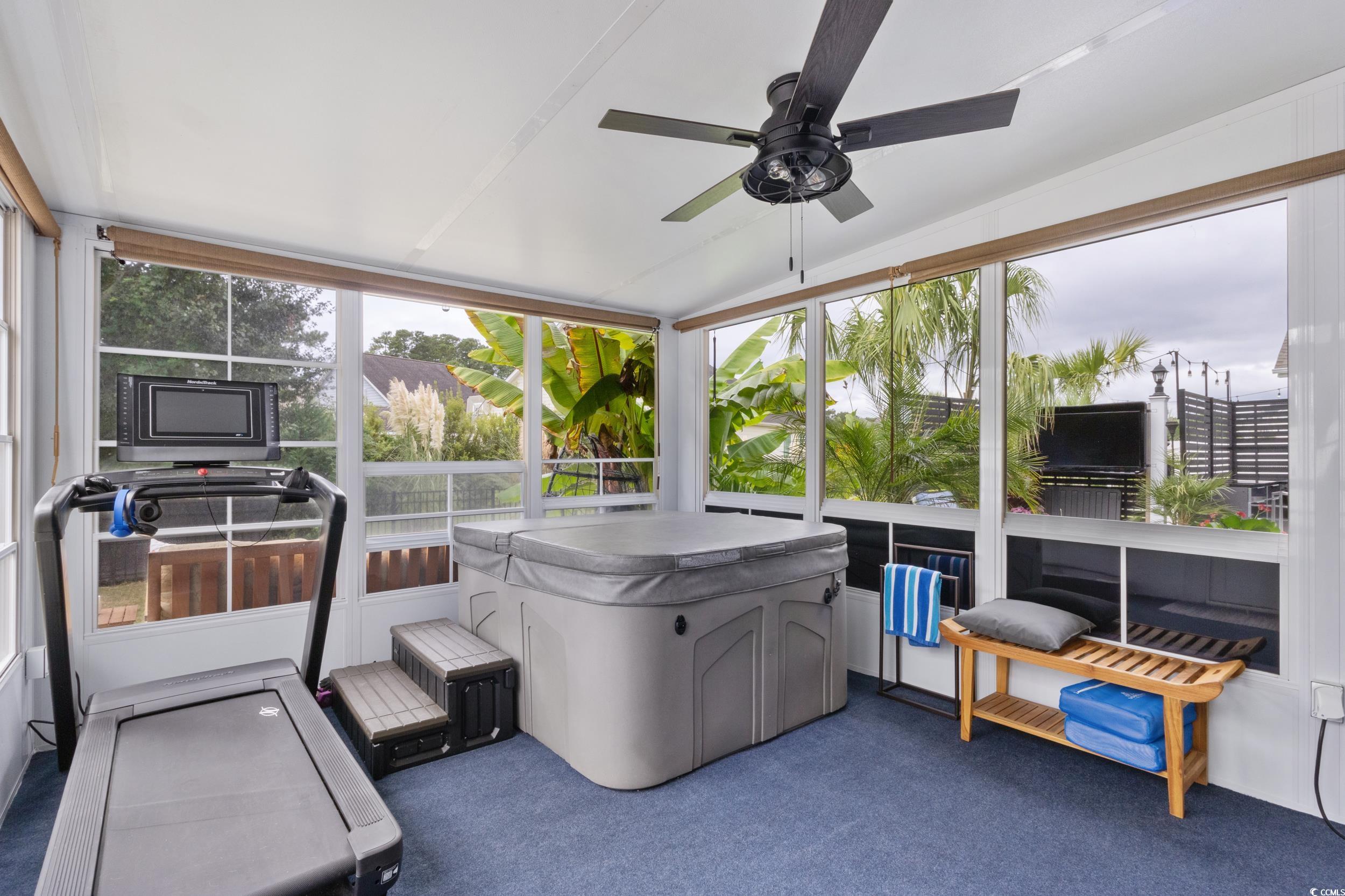 540 Canborough Lane Murrells Inlet, SC 29576 - Photo 29 of 40 Sunroom / solarium featuring healthy amount of natural light, vaulted ceiling, and a jacuzzi