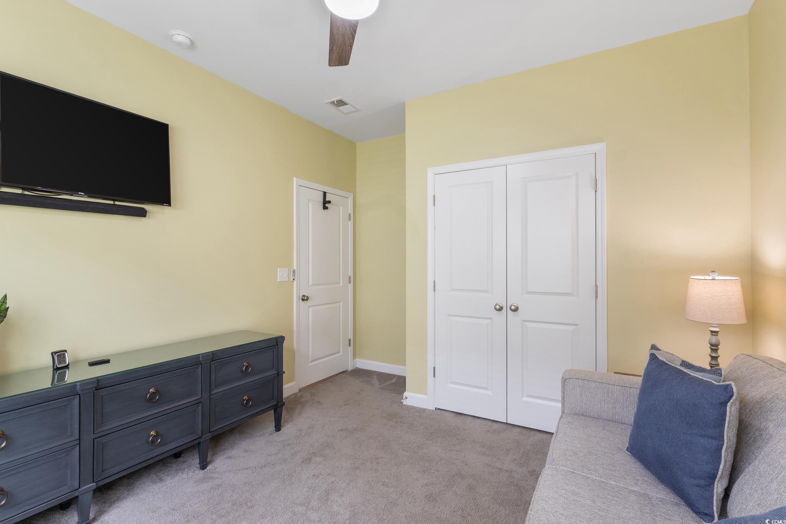 540 Canborough Lane Murrells Inlet, SC 29576 - Photo 30 of 40 Sitting room featuring light colored carpet and a ceiling fan