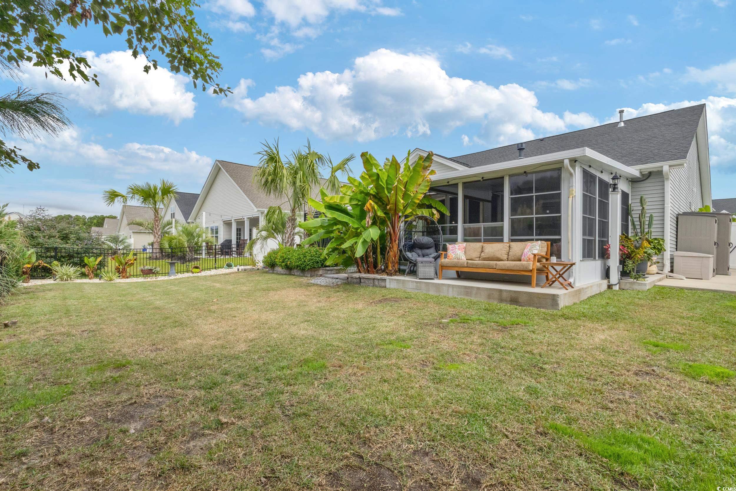 540 Canborough Lane Murrells Inlet, SC 29576 - Photo 38 of 40 Rear view of house featuring a sunroom