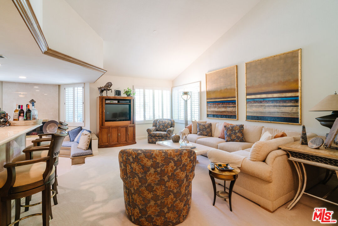 17835 Lemarsh Street Northridge, CA 91325 - Photo 12 of 41 a living room with furniture and a large window