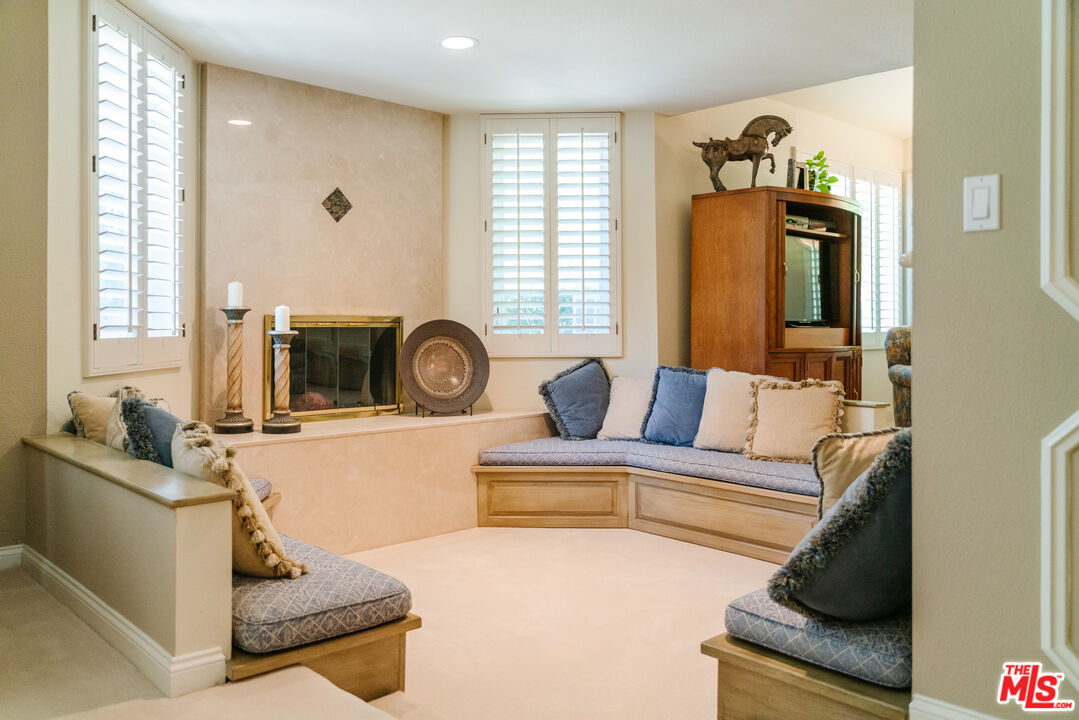 17835 Lemarsh Street Northridge, CA 91325 - Photo 16 of 41 a living room with furniture and a flat screen tv