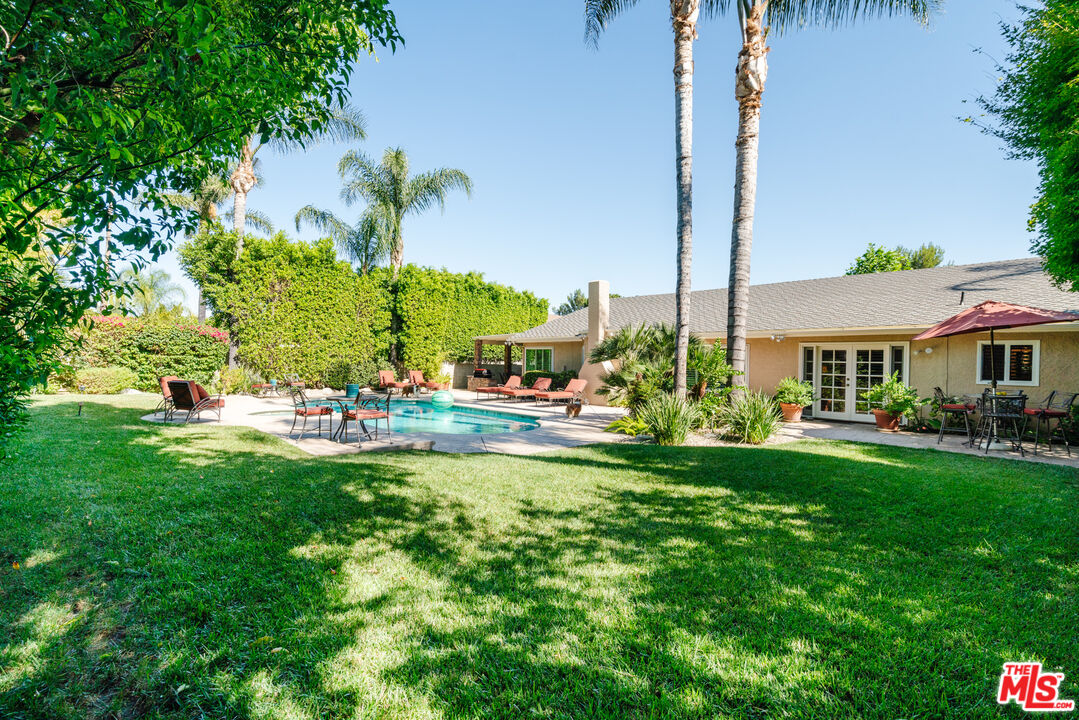 17835 Lemarsh Street Northridge, CA 91325 - Photo 2 of 41 a front view of a house with garden