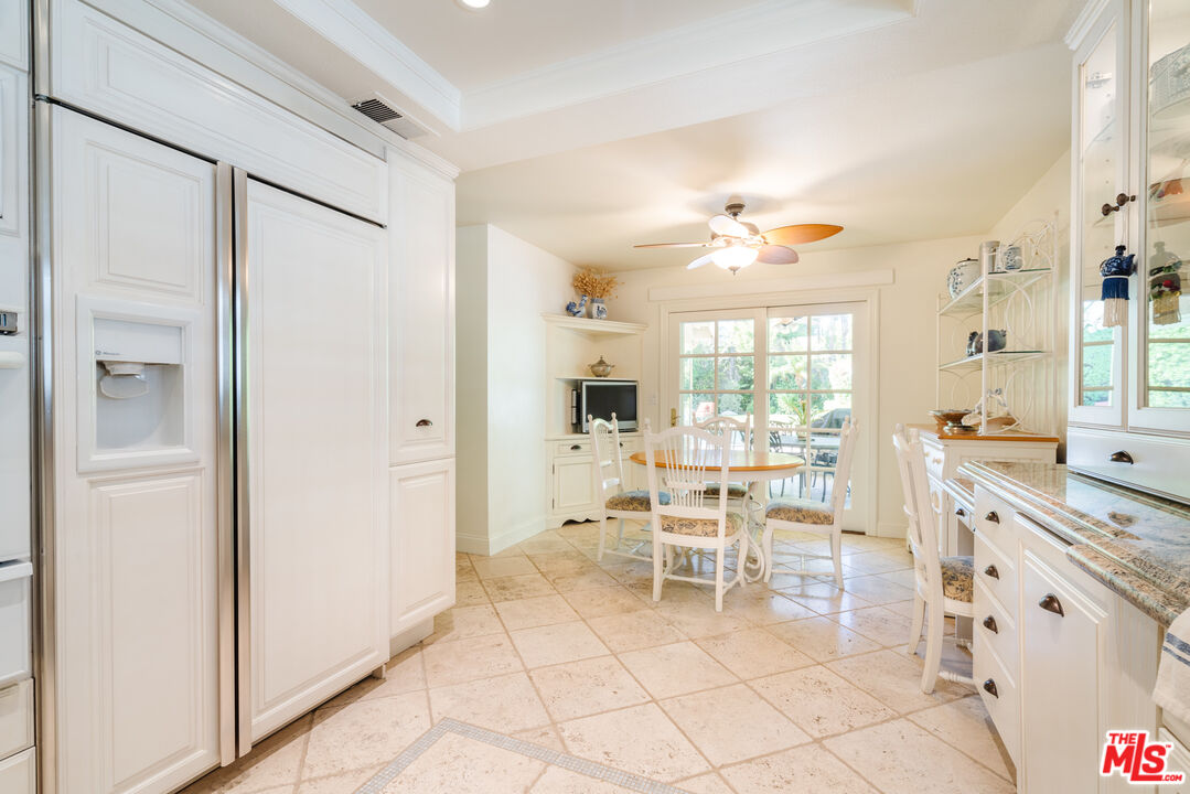 17835 Lemarsh Street Northridge, CA 91325 - Photo 21 of 41 a living room with furniture a table and chairs