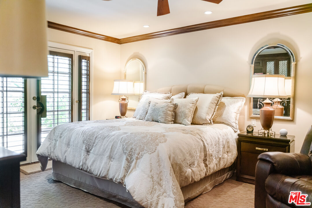 17835 Lemarsh Street Northridge, CA 91325 - Photo 25 of 41 a bedroom with a bed and a window