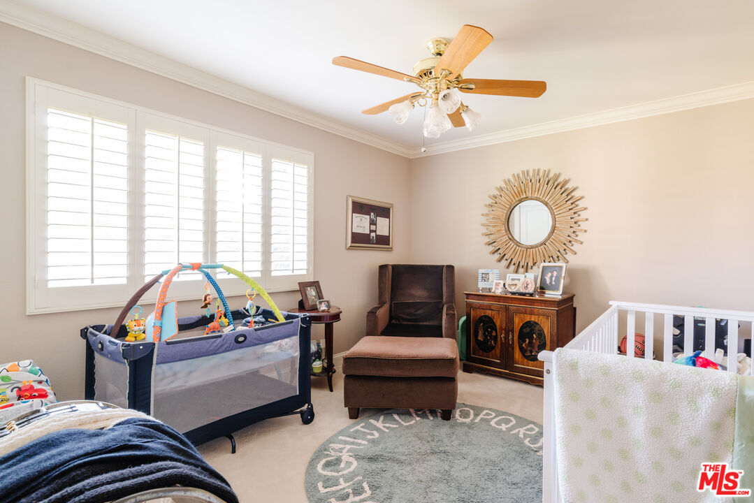 17835 Lemarsh Street Northridge, CA 91325 - Photo 32 of 41 a living room with furniture and a window