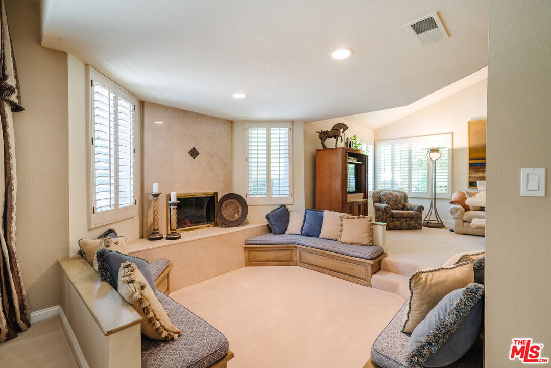 17835 Lemarsh Street Northridge, CA 91325 - Photo 9 of 41 a living room with furniture and a large window