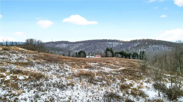 a view of lake with mountain and lake view