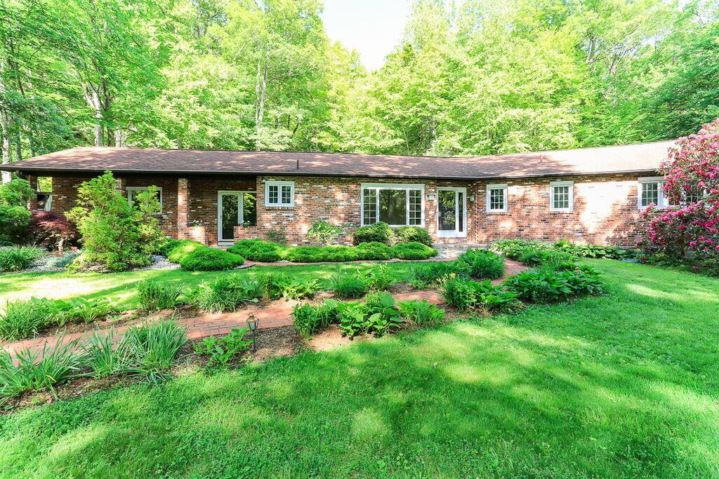 74 Morris Hubbard Road Haddam, CT 06441 - Photo 1 of 1 front view of a house with a yard
