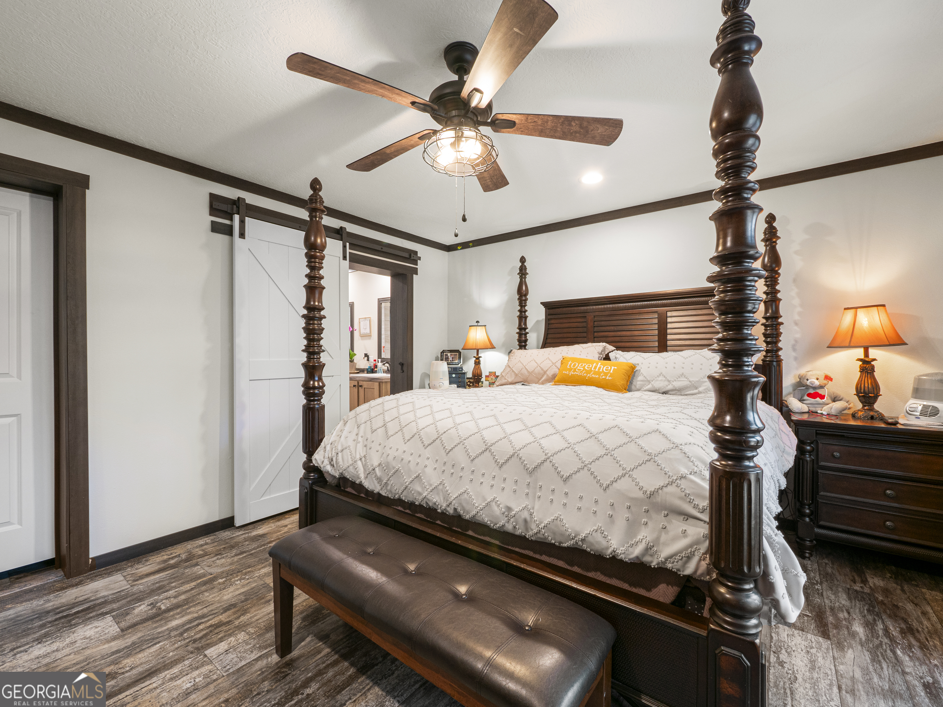 163 M M T Trail Commerce, GA 30530 - Photo 24 of 32 a bedroom with bed and wooden floor