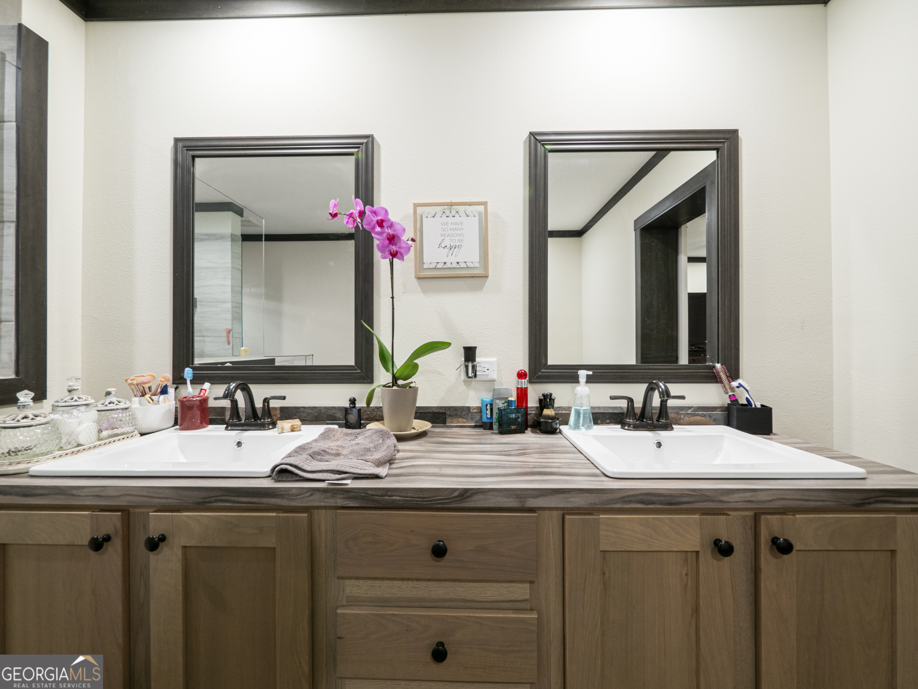 163 M M T Trail Commerce, GA 30530 - Photo 27 of 32 a bathroom with a double vanity sink and a mirror