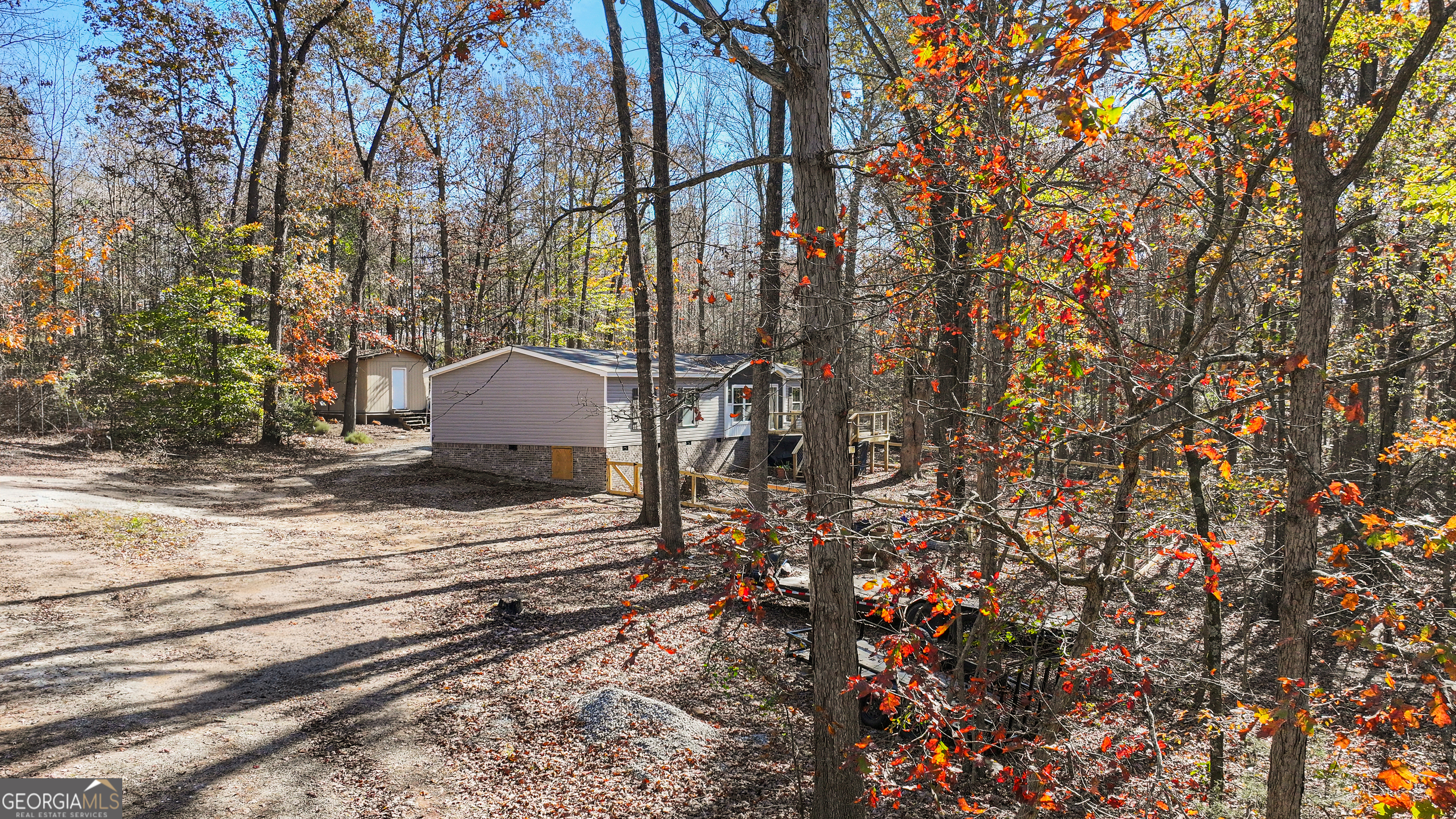 163 M M T Trail Commerce, GA 30530 - Photo 29 of 32 a view of a yard with plants and trees