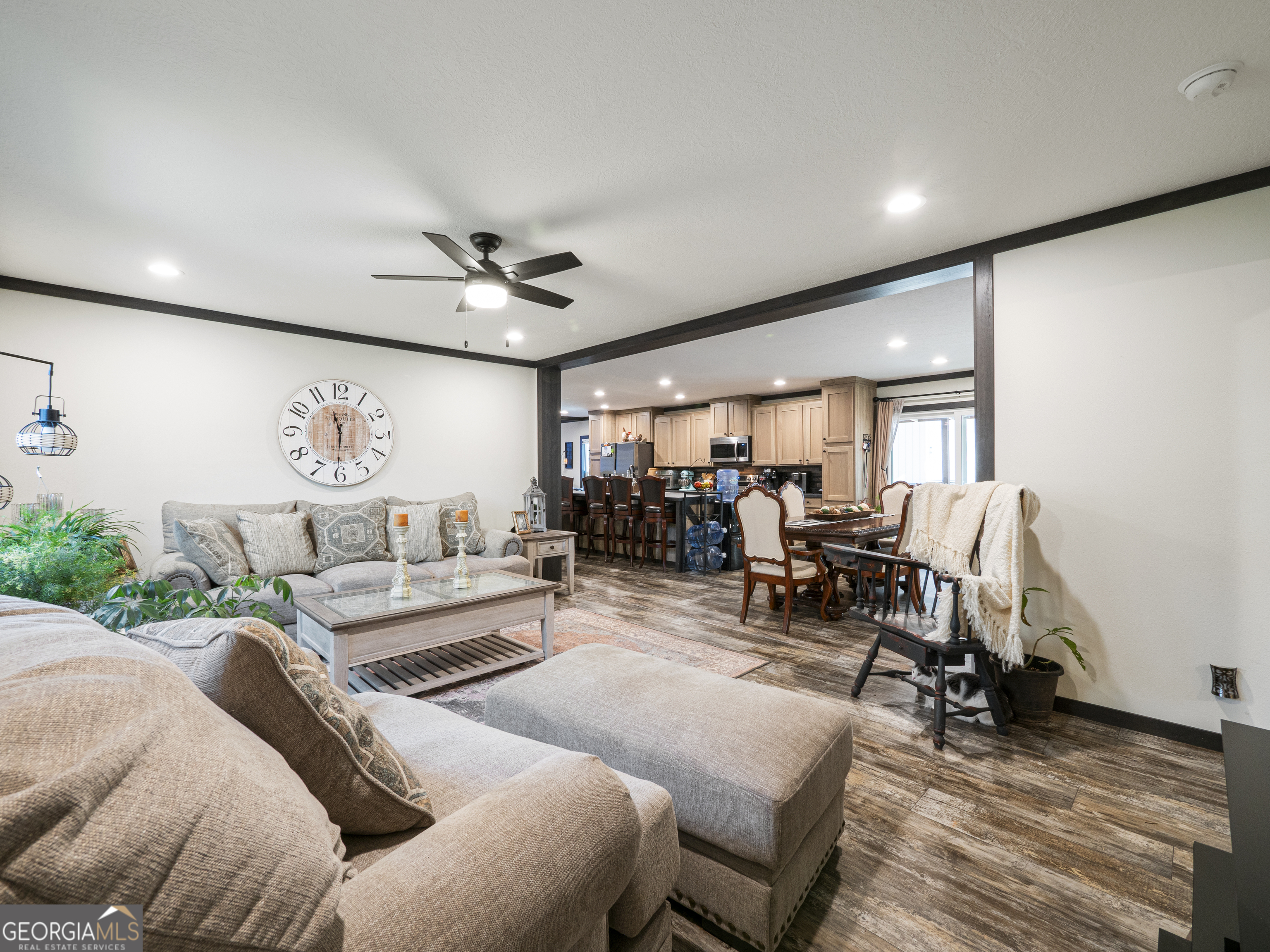 163 M M T Trail Commerce, GA 30530 - Photo 6 of 32 a living room with furniture and wooden floor