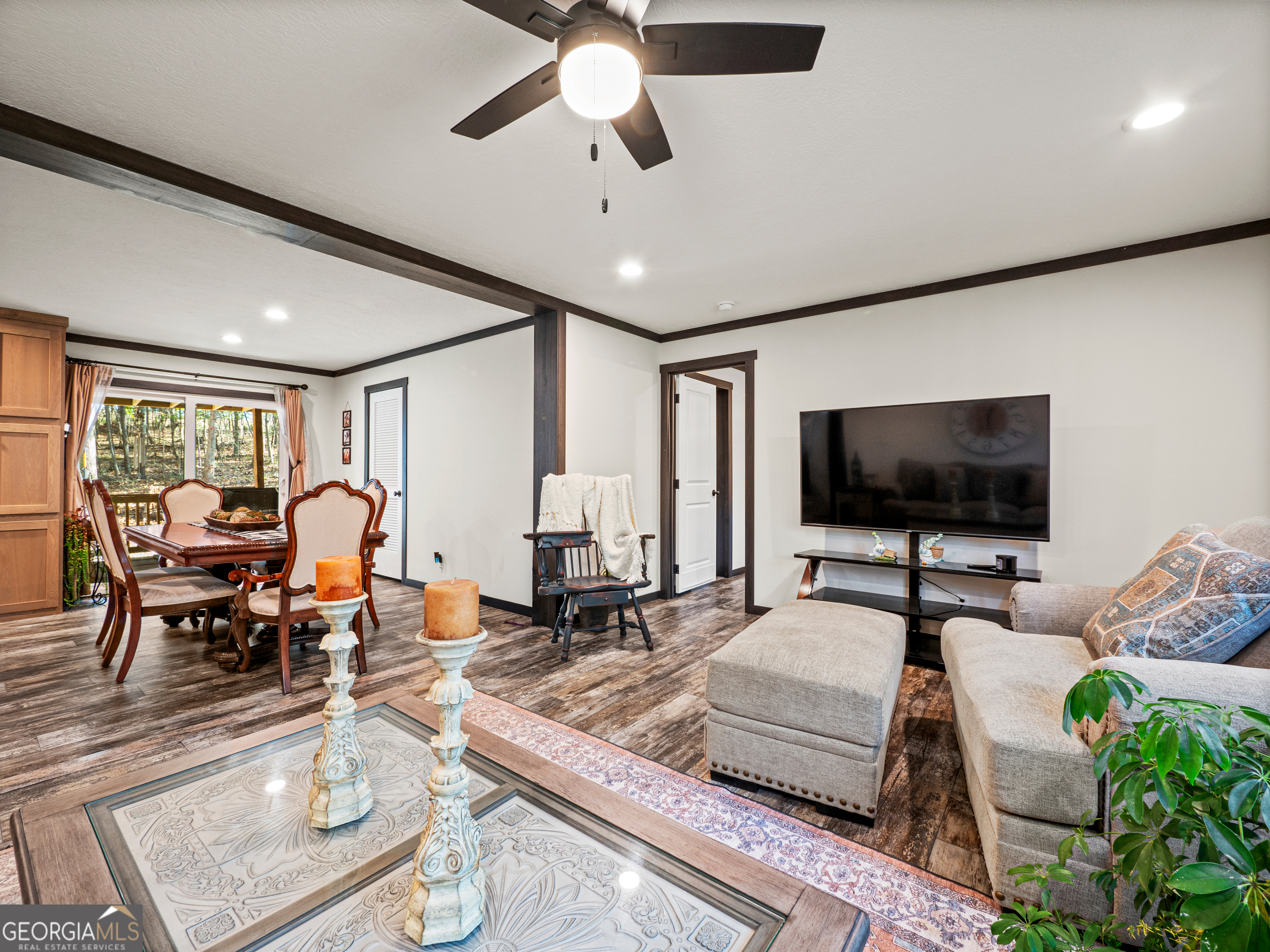 163 M M T Trail Commerce, GA 30530 - Photo 8 of 32 a living room with furniture and a flat screen tv
