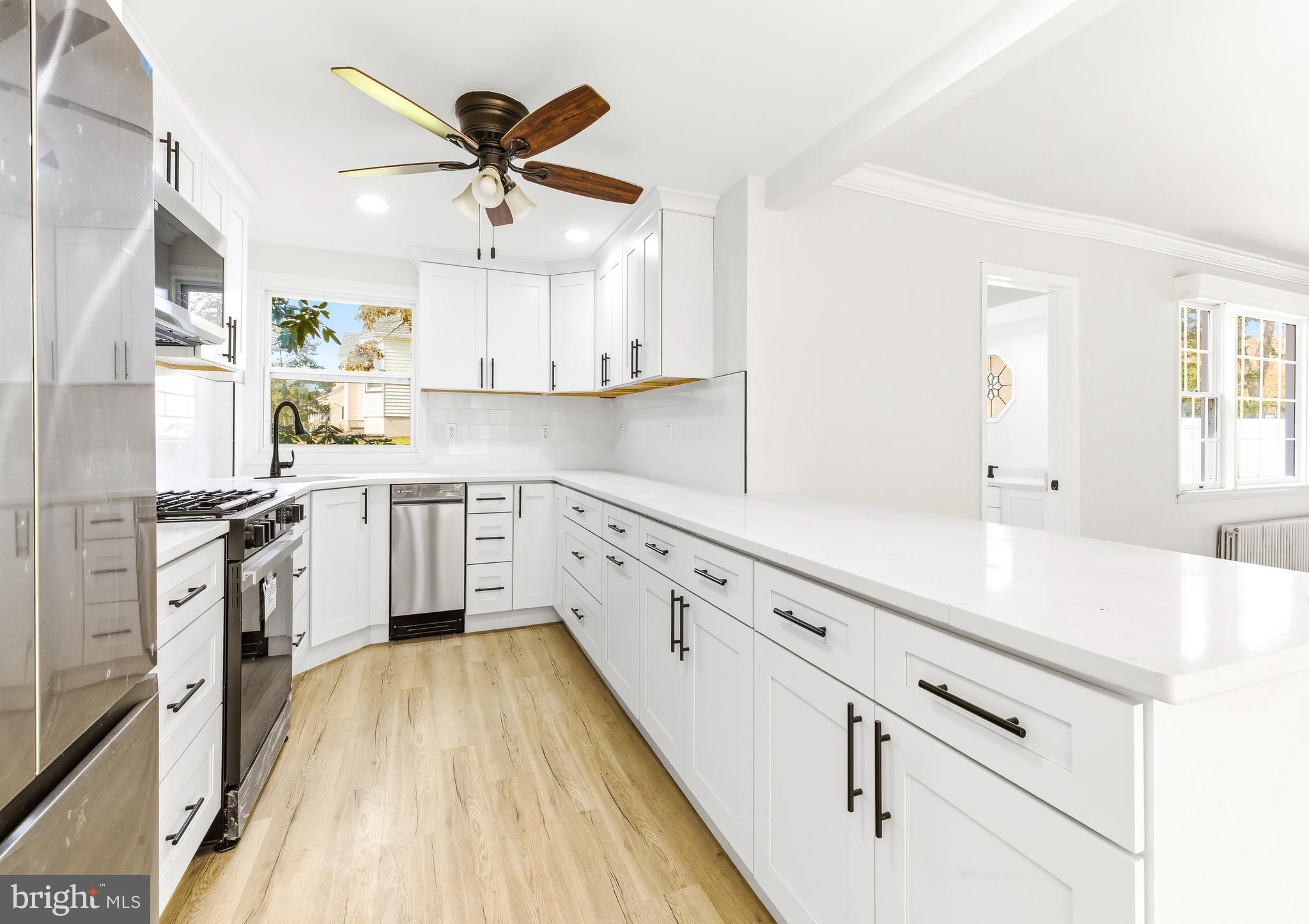 110 East Seaview Avenue Linwood, NJ 08221 - Photo 12 of 48 a kitchen with cabinets a sink and appliances