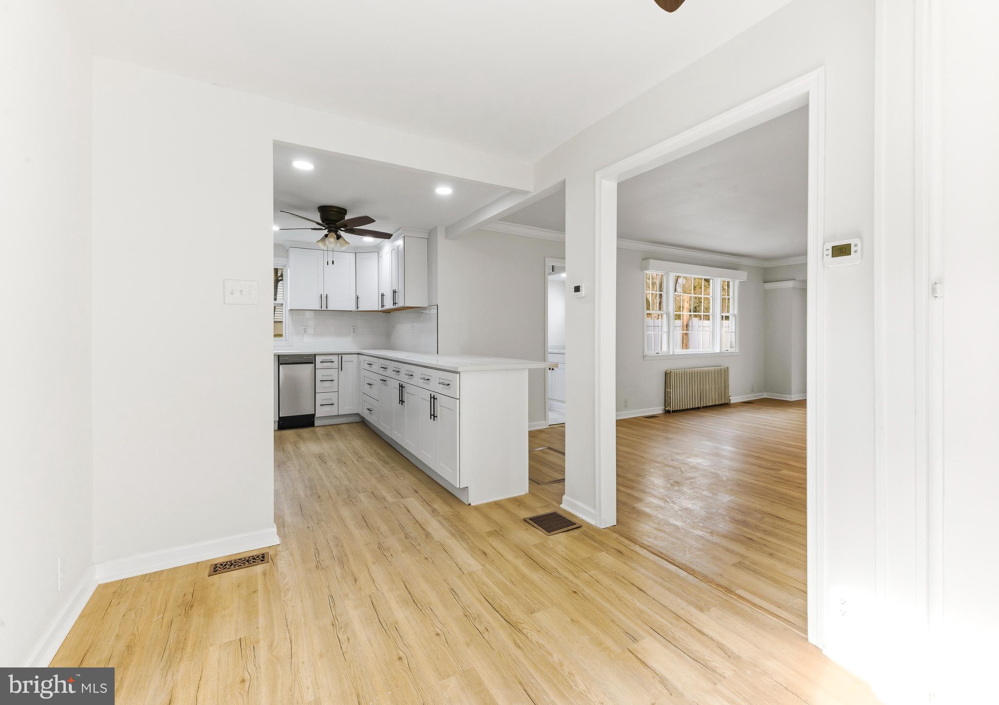 110 East Seaview Avenue Linwood, NJ 08221 - Photo 13 of 48 a kitchen with stainless steel appliances granite countertop a sink and cabinets