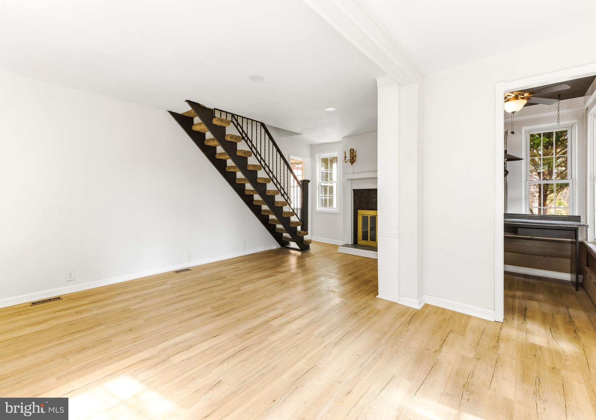 110 East Seaview Avenue Linwood, NJ 08221 - Photo 15 of 48 a view of a hallway with wooden floor and staircase