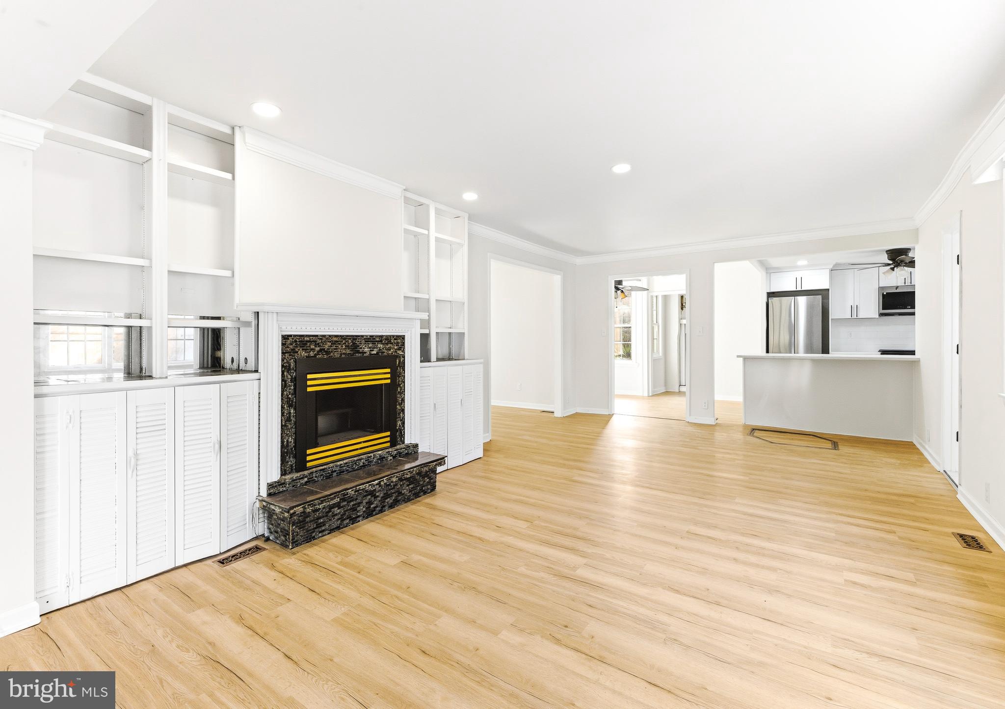 110 East Seaview Avenue Linwood, NJ 08221 - Photo 9 of 48 a view of a kitchen with a sink and a fireplace