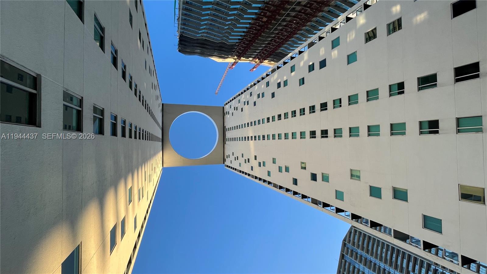 55 Southeast 6th Street, Unit 2601 Miami, FL 33131 - Photo 44 of 46 a view of balcony with wooden floor
