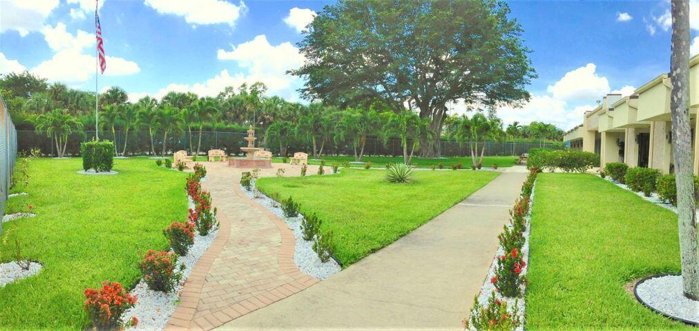 504 Davis Road, Unit 79 Palm Springs, FL 33461 - Photo 22 of 31 Recreational area, office building
