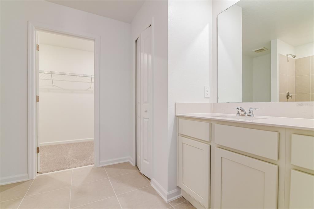 4009 Old Ml Road Haines City, FL 33844 - Photo 16 of 24 a bathroom with a sink and a mirror