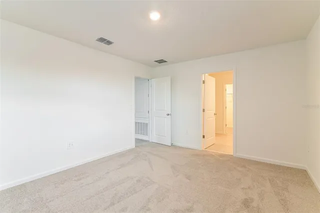 an empty room with a natural light