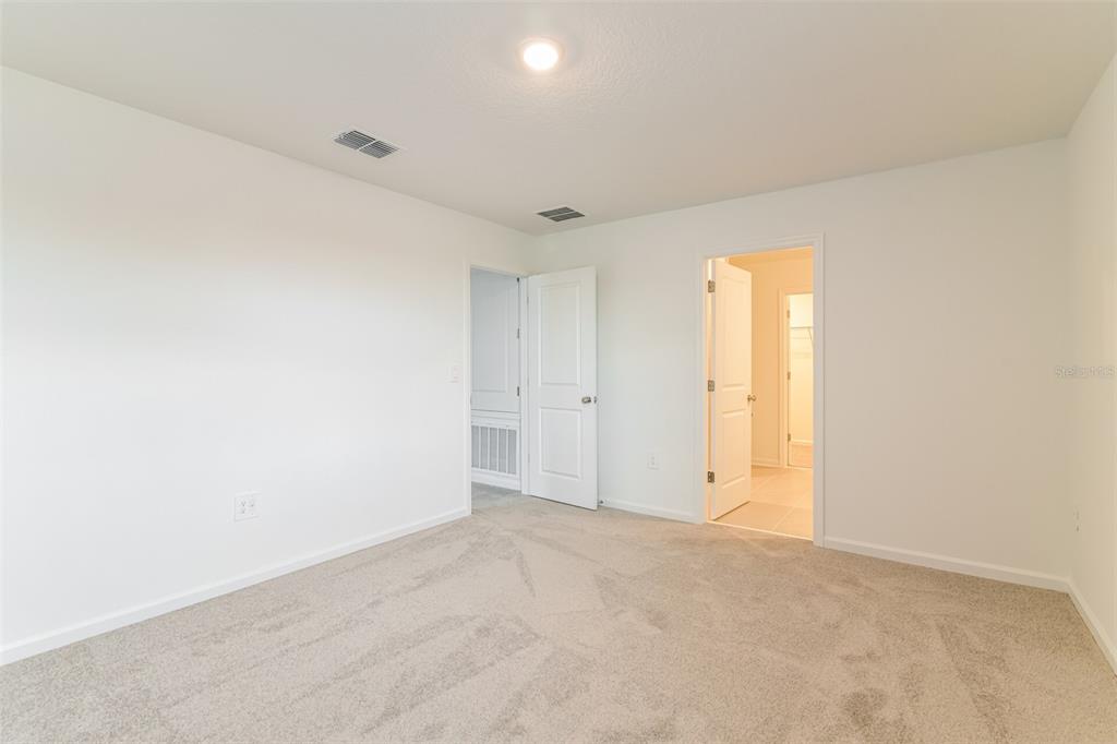 4009 Old Ml Road Haines City, FL 33844 - Photo 17 of 24 an empty room with a natural light