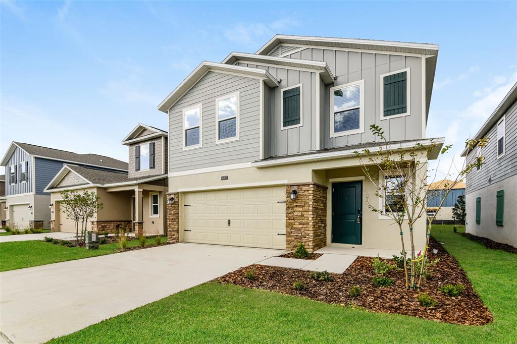 4009 Old Ml Road Haines City, FL 33844 - Photo 2 of 24 a front view of a house with a yard