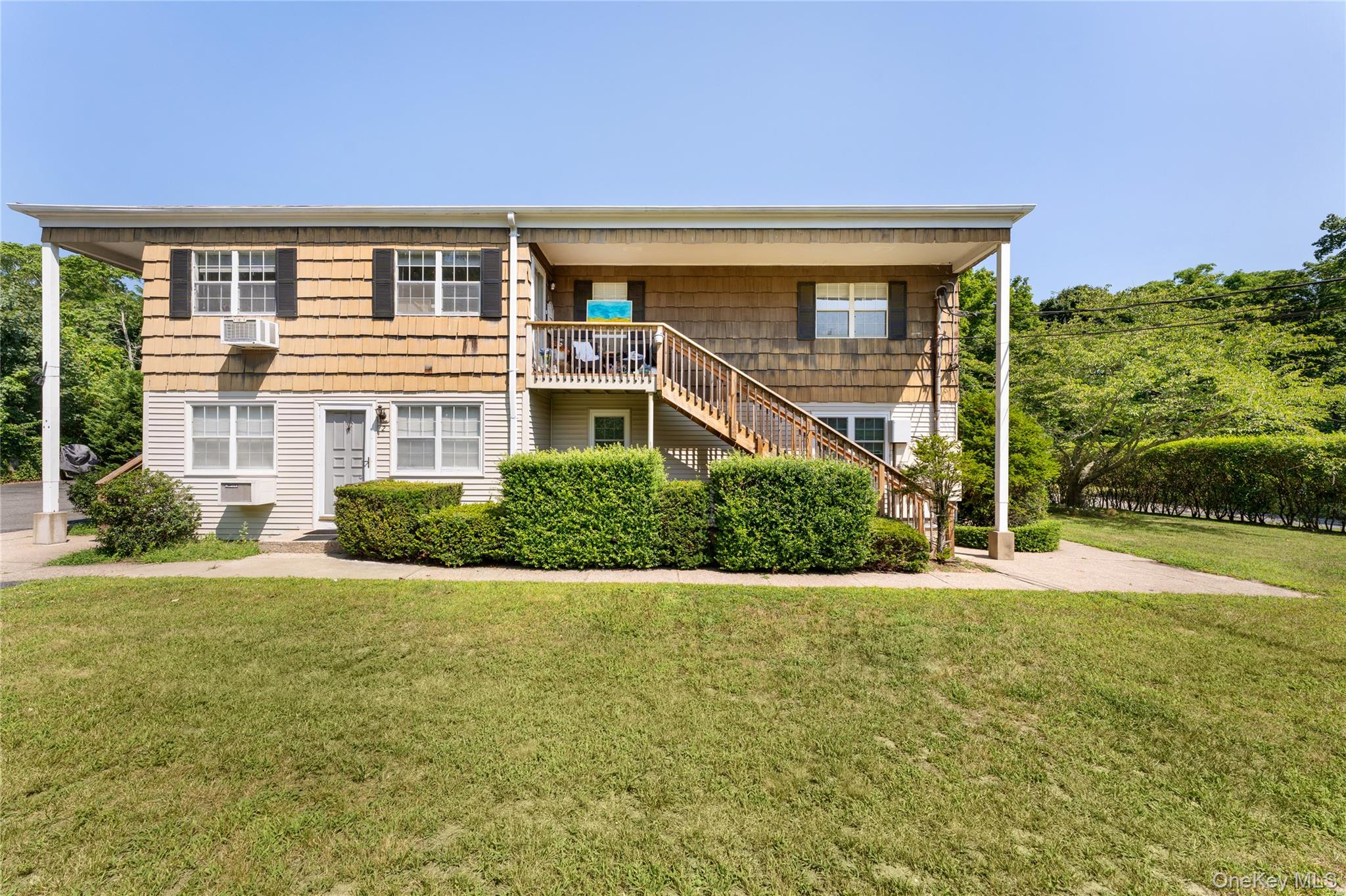 40 Canoe Place Road, Unit 5 Hampton Bays, NY 11946 - Photo 1 of 12