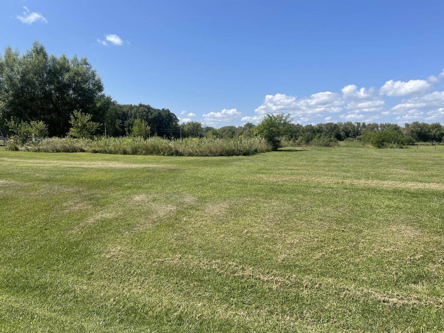 4705 East 1389th Road Earlville, IL 60518 - Photo 5 of 5 a view of an ocean from a yard