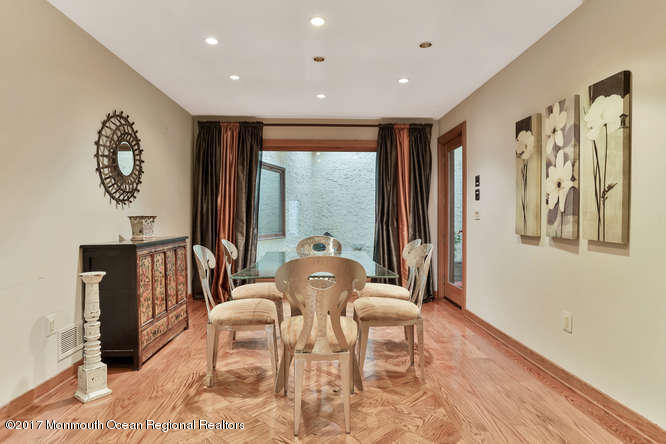 1644 Martin Road Neptune, NJ 07753 - Photo 12 of 42 a living room with furniture and a large window