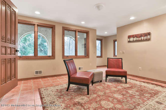 1644 Martin Road Neptune, NJ 07753 - Photo 18 of 42 a view of a livingroom with furniture and windows